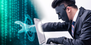 A man reaching into his computer